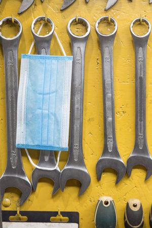 A set of tools in a workshop during an epedemic. Close-up.