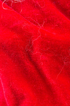 The red texture of the woolen fabric. High-quality macro photography. It occupies the entire surface of the image. Close-up.の写真素材