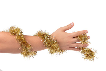 Tinsel is wrapped around the arm. Isolated over white background. Close-up.