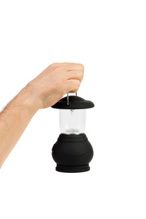 Retro black LED lantern for camping isolated in white background. Rechargeable lighting.の写真素材