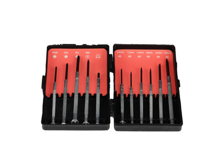A set of screwdrivers in a plastic box. Isolated over wnite background. Close-up.の写真素材