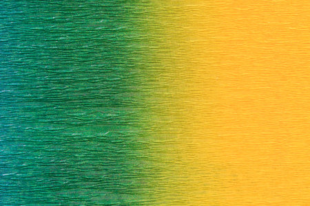 Multicolor crepe paper with gradient texture. It si occupies the entire surface of the image. Close-up.の写真素材