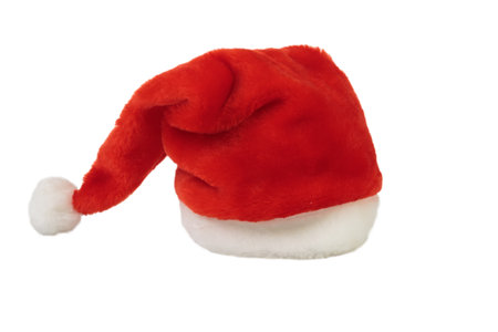 Single Santa Claus red hat. Isolated on white background. Close-up.の写真素材