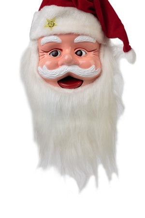 A mask of Santa Claus. Isolated over white background. Close-up.の写真素材