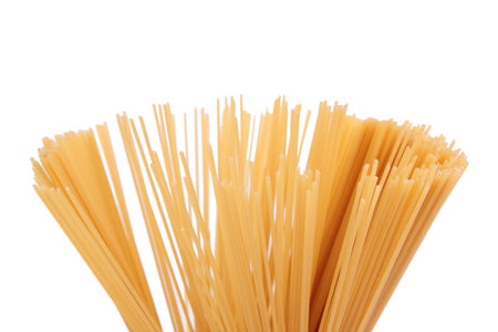 Spaghetti folded in a budle. It is located on a white surface. Close-up.の写真素材
