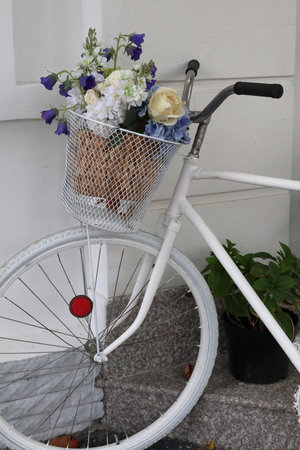 Bicycle with a bouquet of flowers.の写真素材