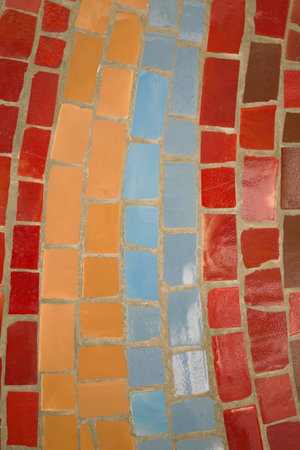 The background is made using mosaic masonry. Close-up.の写真素材