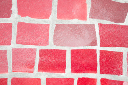 The background is made using mosaic masonry. Close-up.の写真素材