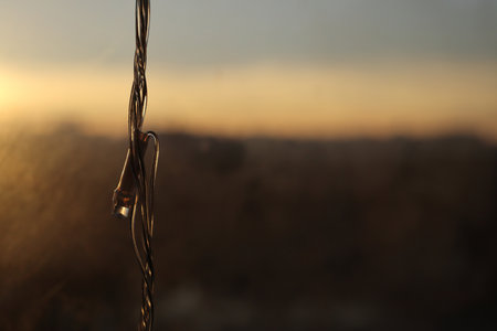 LED garland on a blurred background. View from the window of the evening city.の写真素材