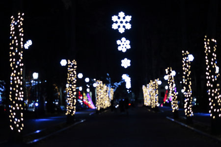 Abstract background of city street in bokeh. There is a dark place for text at the bottom of the image.の写真素材