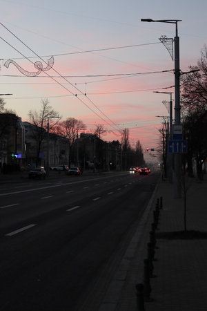 Stefan cel Mare Boulevard at sunset. Evening Chisinau on New Year's Eve. The Republic of Moldova. December 31, 2023.の写真素材