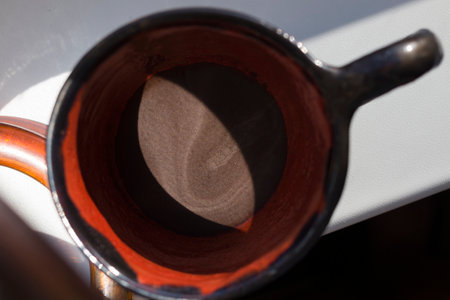 A sunbeam on the coffee grounds. Close-up.の写真素材