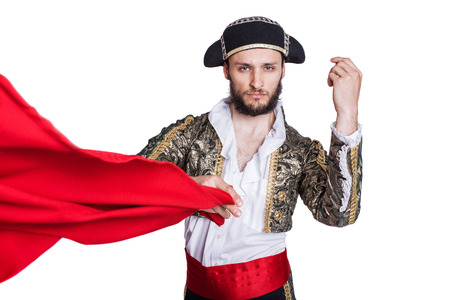 Man dressed as matador on a white backgroundの写真素材