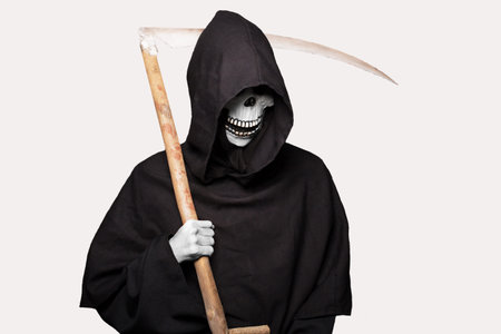 Halloween character: grim reaper. Studio portrait isolated on white background