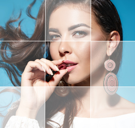 Beautiful young sexy brunette with beautiful make-up natural beauty dressed in fashionable stylish evening dress for prom or party expensive jewelry diamond earringsの写真素材