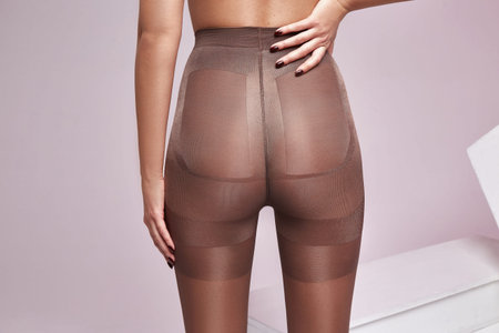 Part of woman body perfect shape hips legs skin tan wear stockings, nylons, pantyhose lingerie...