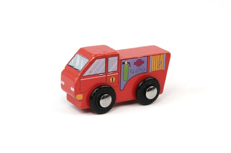 Vintage worn red wooden toy fire truckの写真素材