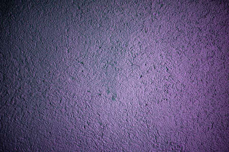 Photography image of beautiful abstract light violet, rough cement wall background in warm mood with fine texture.の写真素材