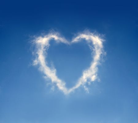 The cloud in the form of heart against a blue sky. To the Valentine's Day joke. の写真素材