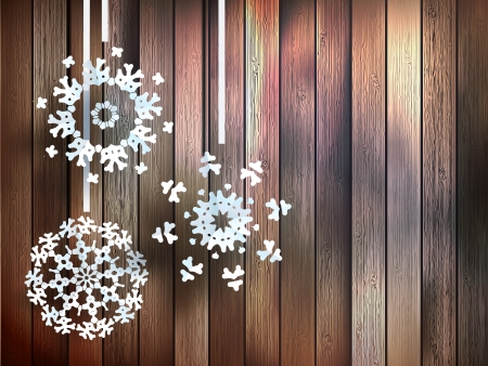 Christmas decorations, snowflakes hanging over wooden background. のイラスト素材