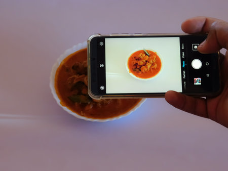 Closeup View of a mobile camera capturing a dish image