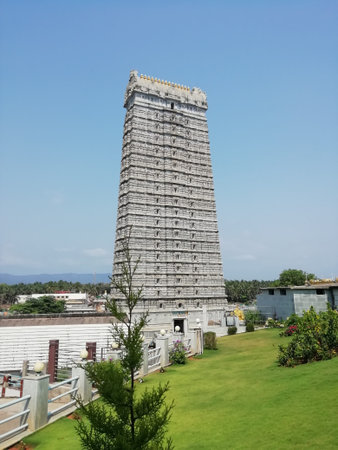 A temple dome ( Murudeshwar Gopuram or Srirangam Temple gopuram) ancient architecture temple carving design surrounded by landscapes. This is the second tallest dome in the world. near to Siva statueの写真素材