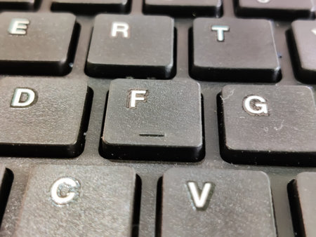 Selective focus on black computer Keyboard with letters closeup view