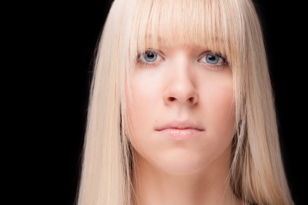 Blue eyed woman on black backroundの写真素材