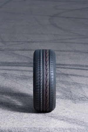 Car tire on roadの写真素材