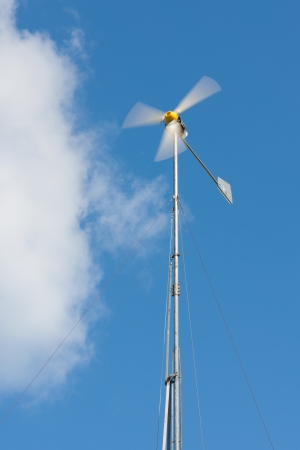 Handmade wind generator with turning bladesの写真素材