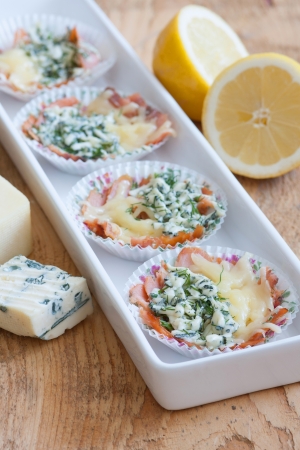 Snacks made of cheese, blue cheese and smoked salmonの写真素材