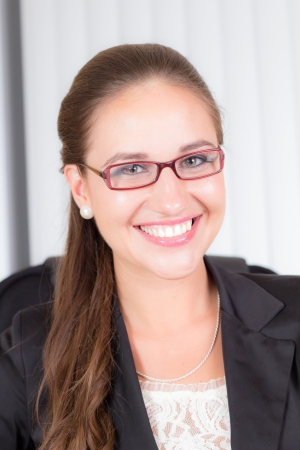 Beautiful smiling businesswoman in officeの写真素材