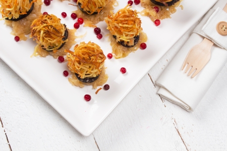 Sauerkraut, blood sausage and frittered vegetable ballsの写真素材