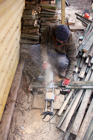 Man making firewoodの写真素材