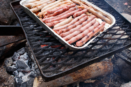 Raw sausages grillingの写真素材