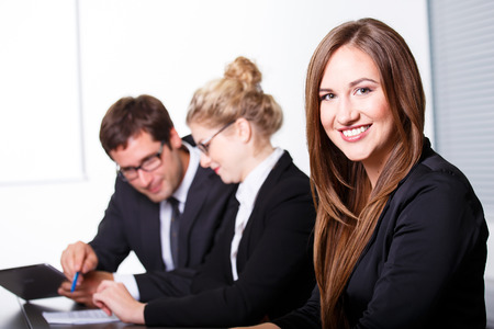 Happy smiling woman in business meetingの写真素材