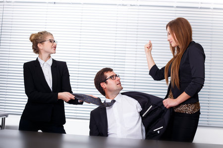 Women fighting for a man in office