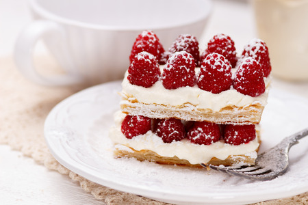 Appetizing french millefeuilles raspberry dessert ready to eatの写真素材