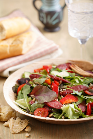 Healthy salad served in bamboo leaf plateの写真素材