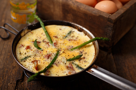 Asparagus and bacon omelet, nutritive breakfastの写真素材