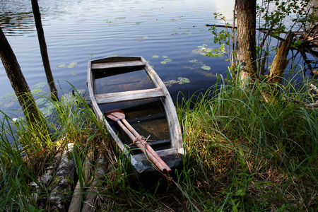 Abandoned fishing boatの写真素材