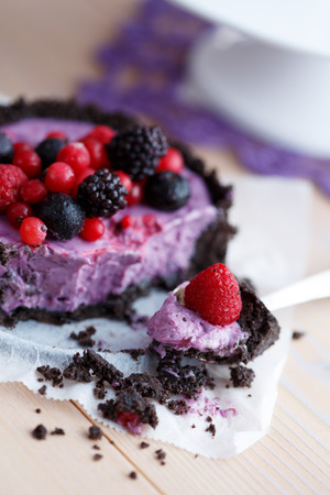 Mascarpone cottage cheese cake decorated with berriesの写真素材