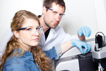 scientists conducting research in a lab environmentの写真素材