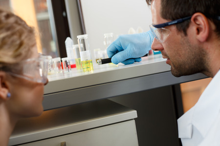 scientists conducting research in a lab environmentの写真素材