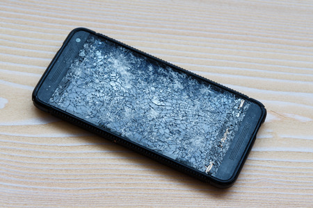 Cracked mobile phoneの写真素材