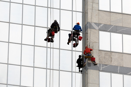 Men cleaning windowsの写真素材