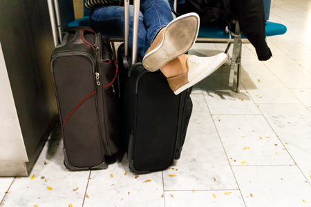 Woman waiting for airplane departureの写真素材