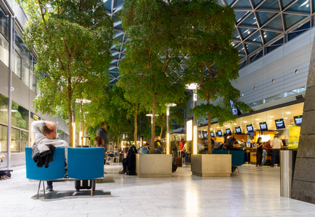 Transfer centre in airport terminal, people in motionのeditorial素材