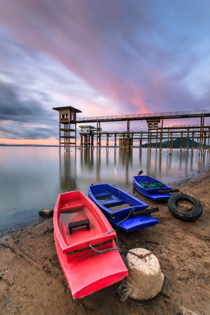 fishing boats at fisherman village with sunsetの写真素材