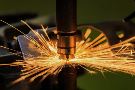 Close-up spot welding machine is welding nut to metal part